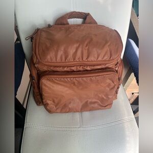 Caraa large baby bag in clay